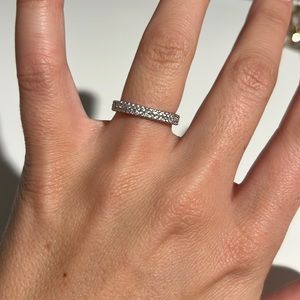 Sterling silver ring with 2 micro pave cubic zirconias.